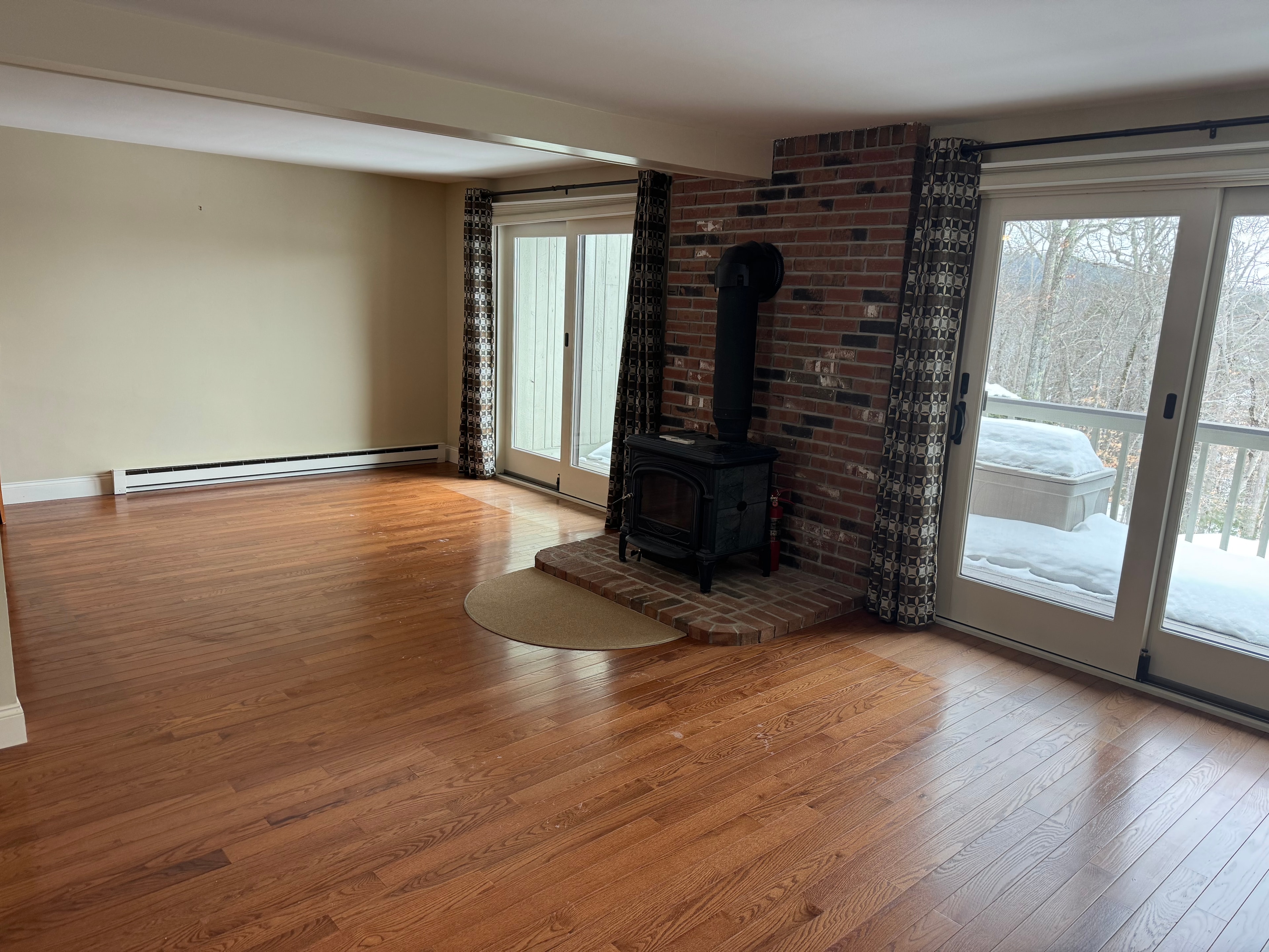 Before staging — lived-in lakeside living room