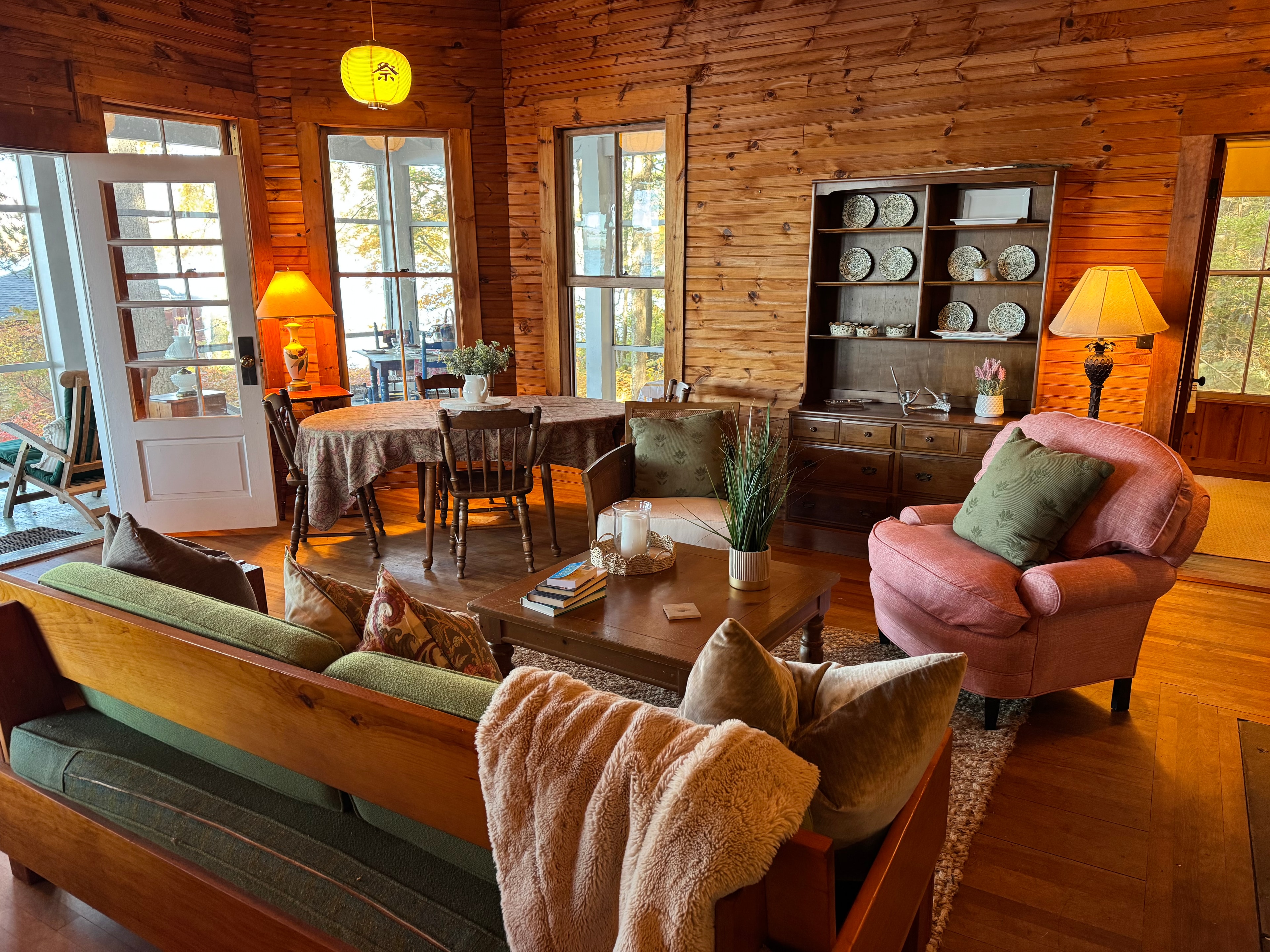 Lake camp living room — wide angle after staging